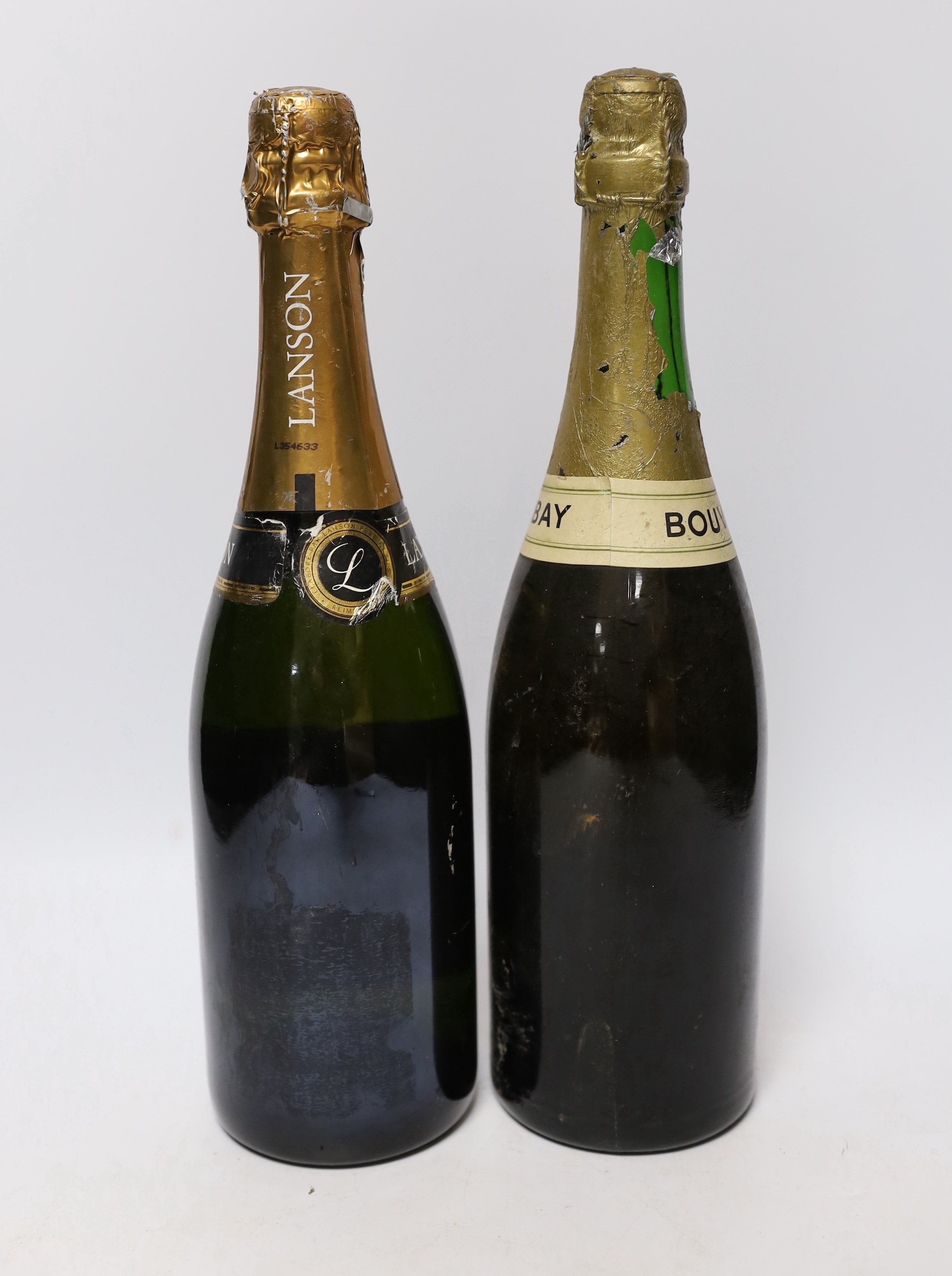 A bottle of Bouvet-Ladubay Champagne and a bottle of Lanson Champagne